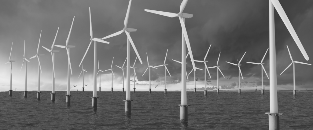 A group of wind turbines in the water
