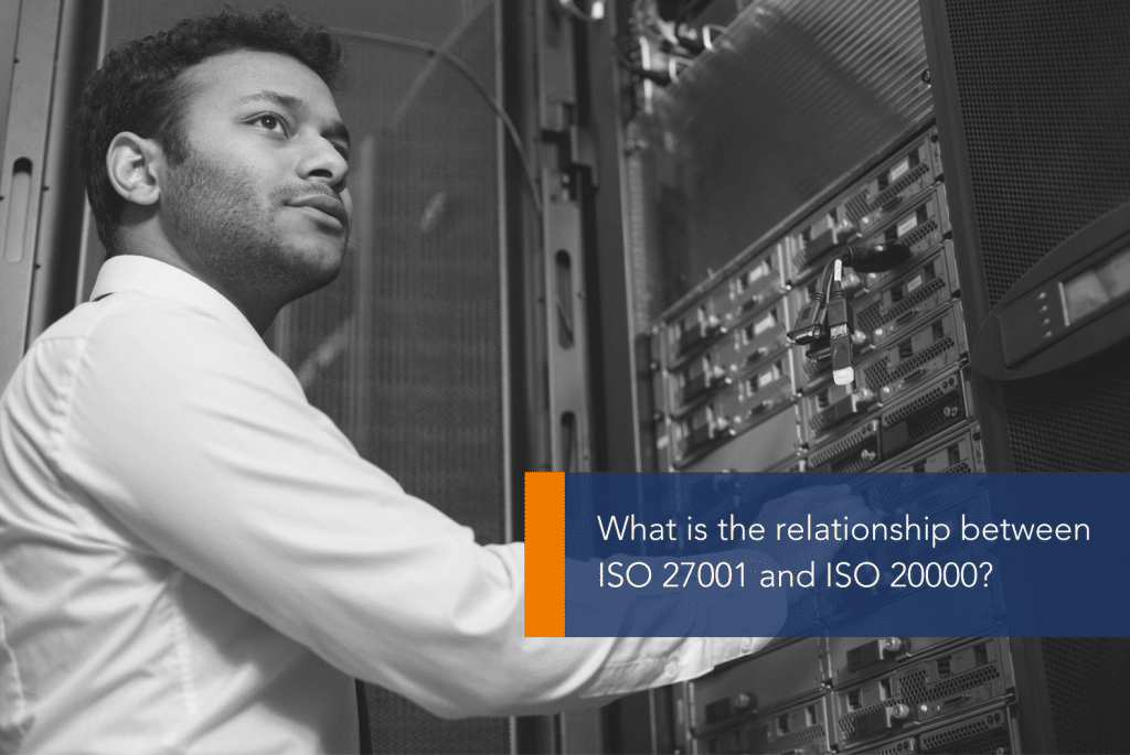 ISO 27001 and ISO 20000 MAIN A person standing in front of a computer