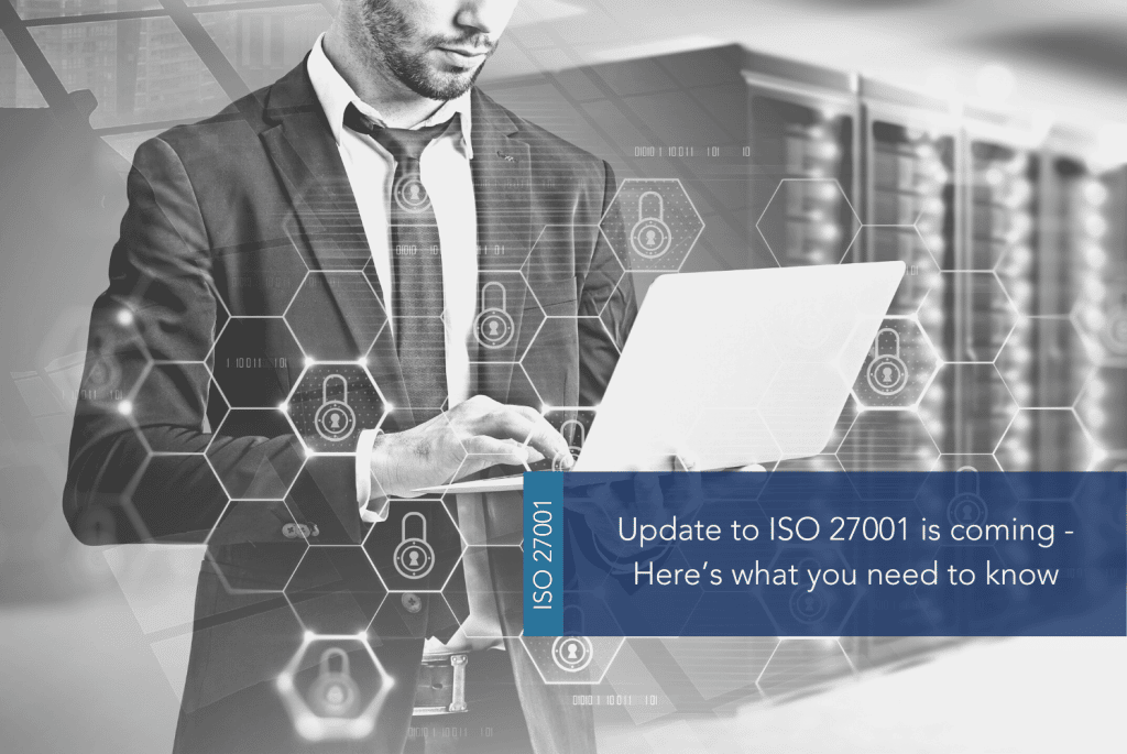 27001 Update Incoming MAIN A person holding a laptop