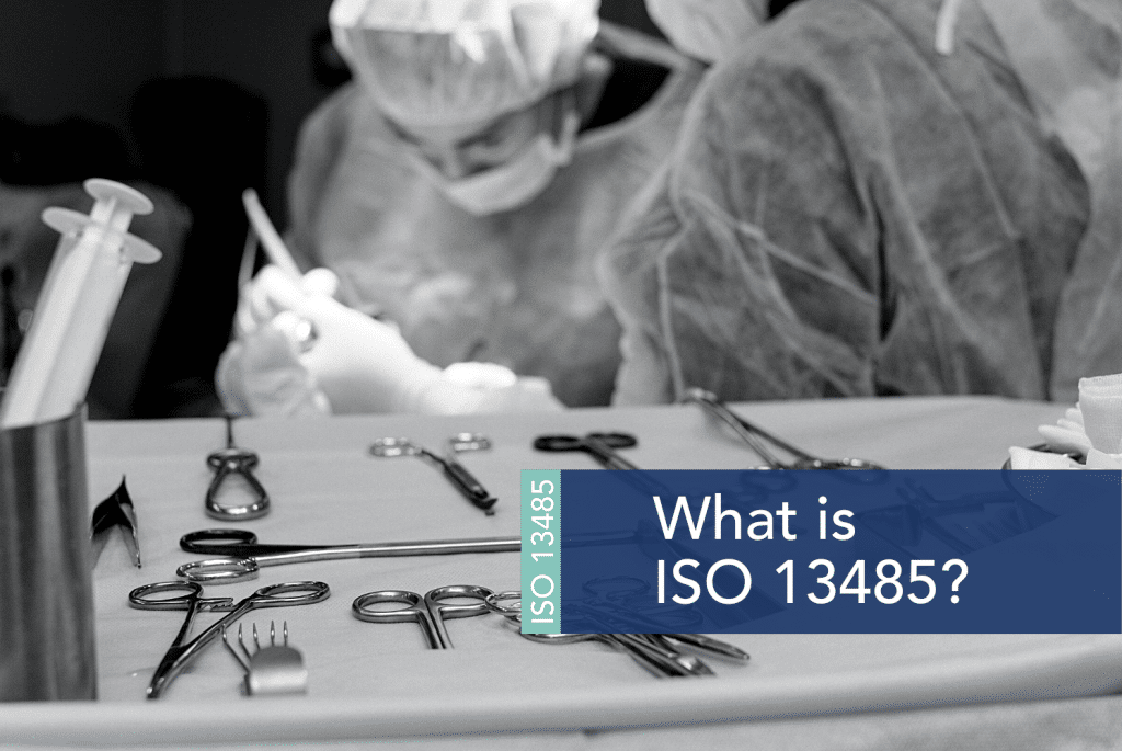 What is ISO 13485? A person in a mask and gloves working on a device