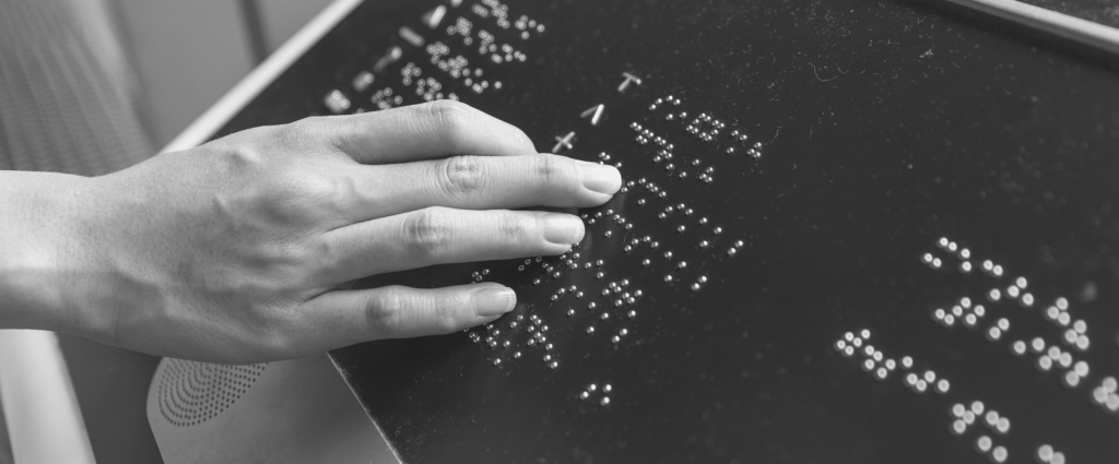 A hand touching a garmentille board