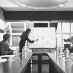 A group of people in a meeting