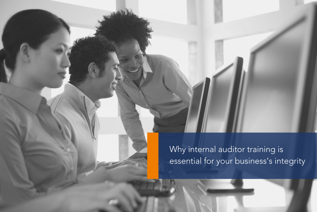 Why internal auditor training is essential for your business’s integrity MAIN A group of people looking at a computer