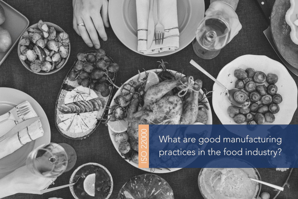What are good manufacturing practices in the food industry MAIN Table filled with food surrounded by hands